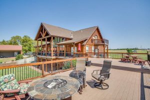 4,600± SqFt Log Home • Shop • Acreage • Pond * Live Creek