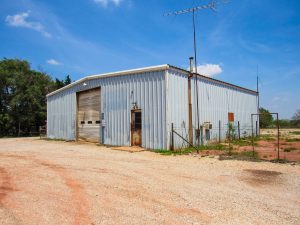 6/5 40’ X 60’ STEEL BUILDING * 1.49 ACRES * PAVED FRONTAGE * ENID OKLAHOMA