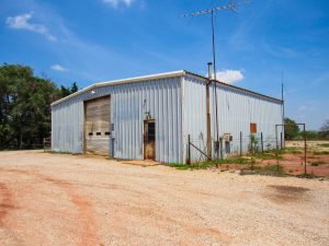 6/5 40’ X 60’ STEEL BUILDING * 1.49 ACRES * PAVED FRONTAGE * ENID OKLAHOMA