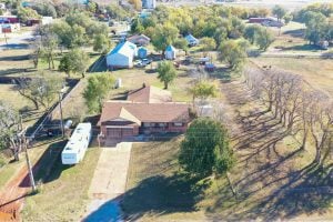 9/16 BRICK HOME * LARGE SHOP * FULL 1-ACRE LOT – LOYAL OK