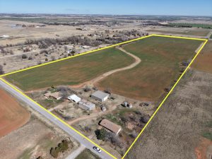 4/2 6305 S 16TH ST ENID OK * 52± ACRES * 2 HOMES * SHEDS * BLACKTOP FRONT-AGE * DESIRABLE LOCATION