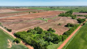 6/5 145± ACRES * CROPLAND * PASTURE * POND * MINERALS * HIGHWAY 81 FRONTAGE GARFIELD COUNTY * WAUKOMIS OK